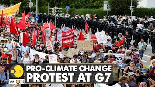 Hundreds of protesters gather outside G7 venue to demand climate protection | World News | WION