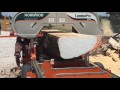 Massiv krokig stock av korstörne på nästan 1½ ton sågas med det transportabla sågverket Norwood HD36