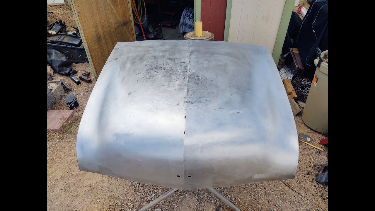 Body work on the 70 year old hood, door and rocker panel