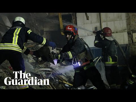 Rescuers dig through rubble after strike hits residential district in ukraine's dnipro