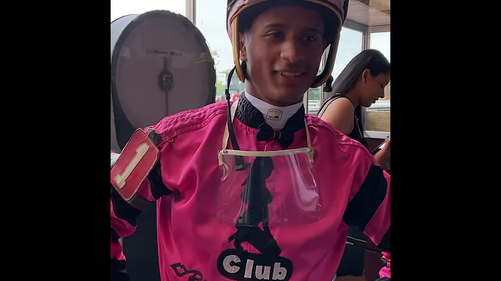 Jockey Luis Ocasio celebrates his win with his fam...