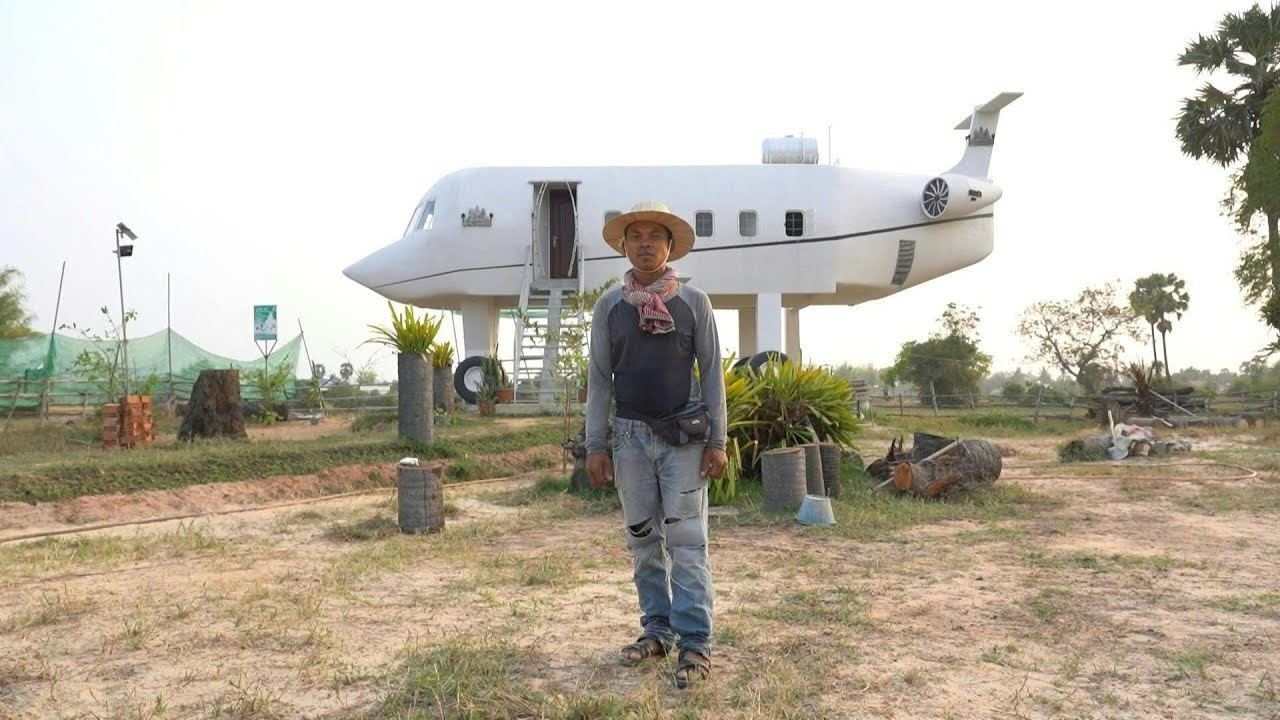 Cambodian man lands 'airplane house' in rice field YouTube