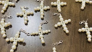 Llaveros en forma de cruz con perlas ✨
