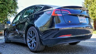 : Tesla   Toyota Camry /     