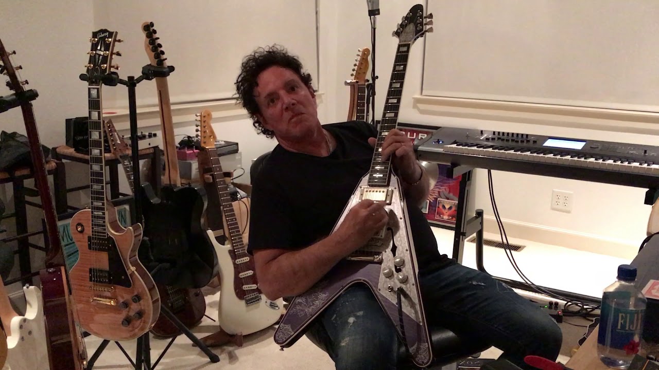 Neal Schon tried IHush Guitars' FV guitar. May 29, 2017.