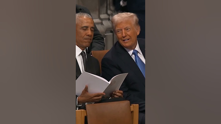 Donald Trump and Barack Obama share a laugh at Jimmy Carter's funeral