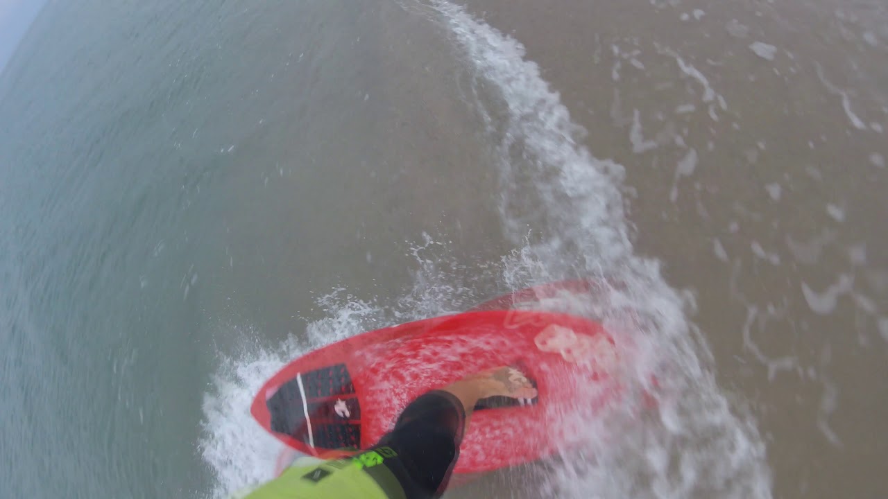 Skimboarding 360 Shuv It In Slow Motion