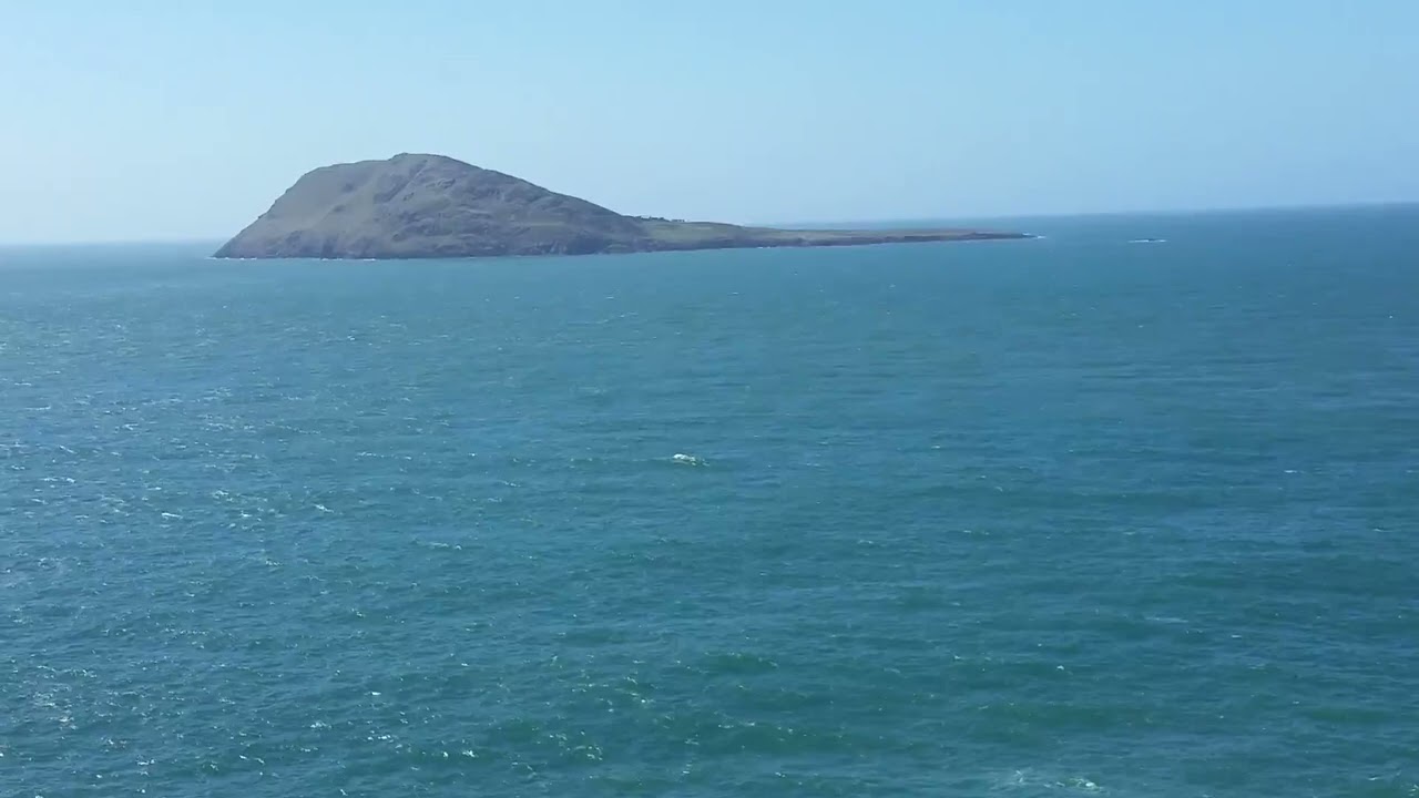 Lynn peninsula camp with wally looking accross to bardsey island