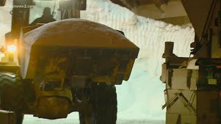 Snowplow trucks working to clear roads
