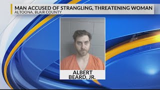 Man accused of strangling, threatening woman