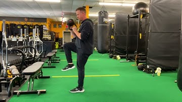 Offset Swing to Reverse Lunge w Knee Drive
