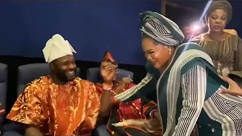 AT THE ORISA PREMIERE OF ODUNLADE ADEKOLA,TOYIN ABRAHAM GREETS NIYI JOHNSON.