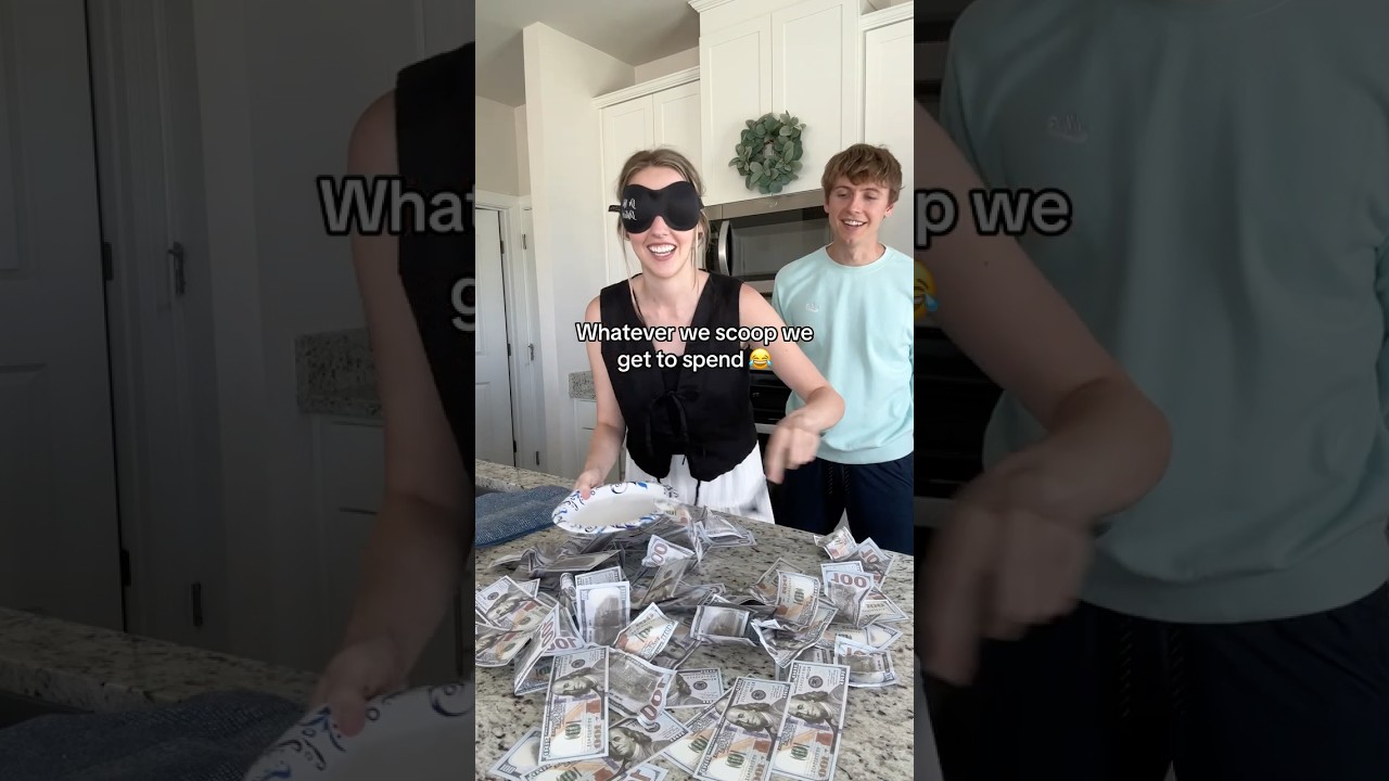 Blindfolded Money Scoop Game Gets Crazy!