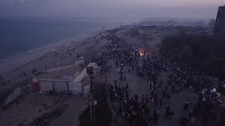 Drone video shows tens of thousands of Palestinians crossing into northern Gaza