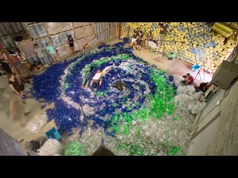 2/3 - Photographer shoots 10,000 used Plastic Bottles and a Mermaid - #MermaidsHatePlastic