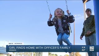 Kingman officer adopts girl after case of abuse