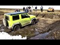 Стандартный Suzuki Jimny в компании подготовленных Нив, УАЗов и Vitara