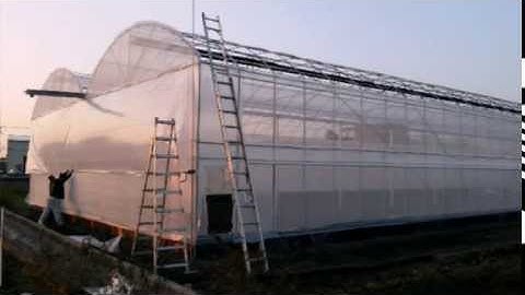 Building a multi span film greenhouse