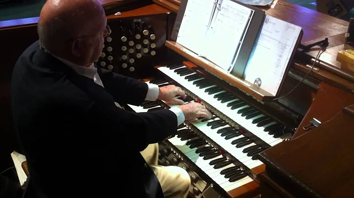 Organist Gerald Claxton playing "Come Thou Fount" ...