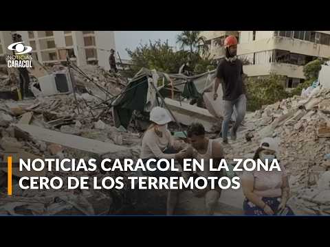 Con sus propias manos, sobrevivientes a tragedia en Venezuela buscan entre escombros a familiares
