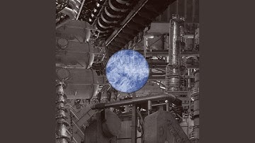 High-rises extrude from asphalt gashes