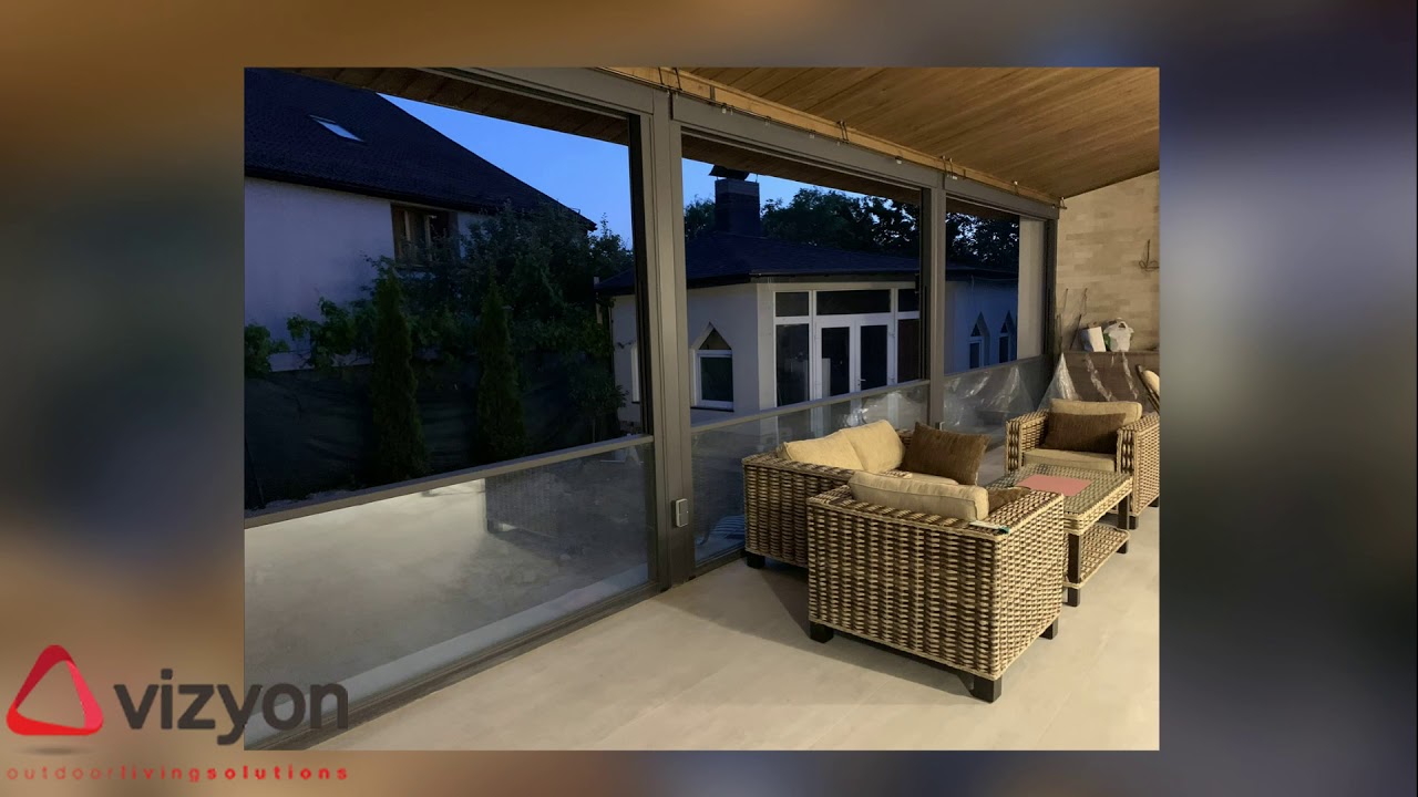 Terrace glazing with guillotine-type systems on Vizyon VGS automation