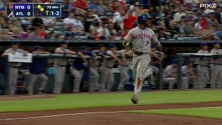 NYM@ATL: Reyes crosses plate on Peterson's error