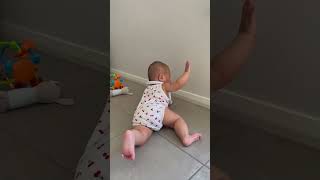 6 months old trying to sit up