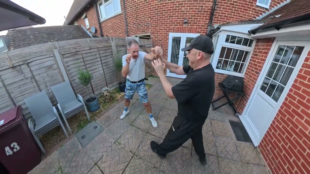 Wing Chun Training. Sticking to opponents punches.