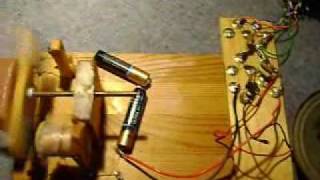 Stains Electric Motor Glissade Combo.wmv
Because both of these items work off 3 volts I connected them together making a sort of electro-mechanical music synthesizer just for the sake of it. One problem with a motor of this type is that the reeds in the switch get magnetised or weld themselves in the shut position. One way round this would be to use a transistor buffer so that the reedswitch deosnt have to handle the electromagnets current. Additionally, the rotor-shaft berings are wood and, after some time running, get a bit stuck. Stains Electric Motor Glissade Combo.wmv