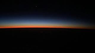 Dawn and sunrise at cruise altitude