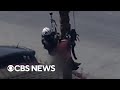 California helicopter crew saves worker dangling from 75-foot tree