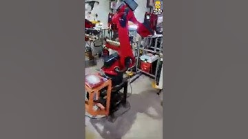 Automated Precision: Punching Machine Robot in Action!