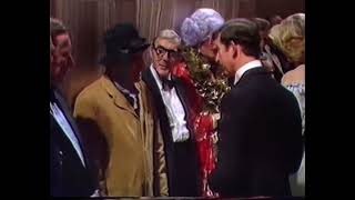 Dame Edna greets The Queen Mother \& The Prince \& Princess of Wales