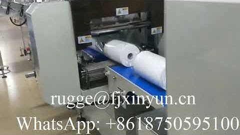 Automatic labeling maxi roll shrink packing machine