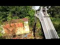 Demolition of an Old House While Forestry Mulching Around a Pond