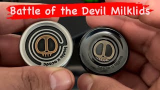 The Battle of the Devil Milklid Haptic Coins by Lautie and ACEDC in Stainless Steel and Zirconium