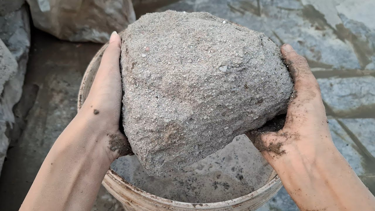 New video Reused cement crumbling in water bucket satisfying