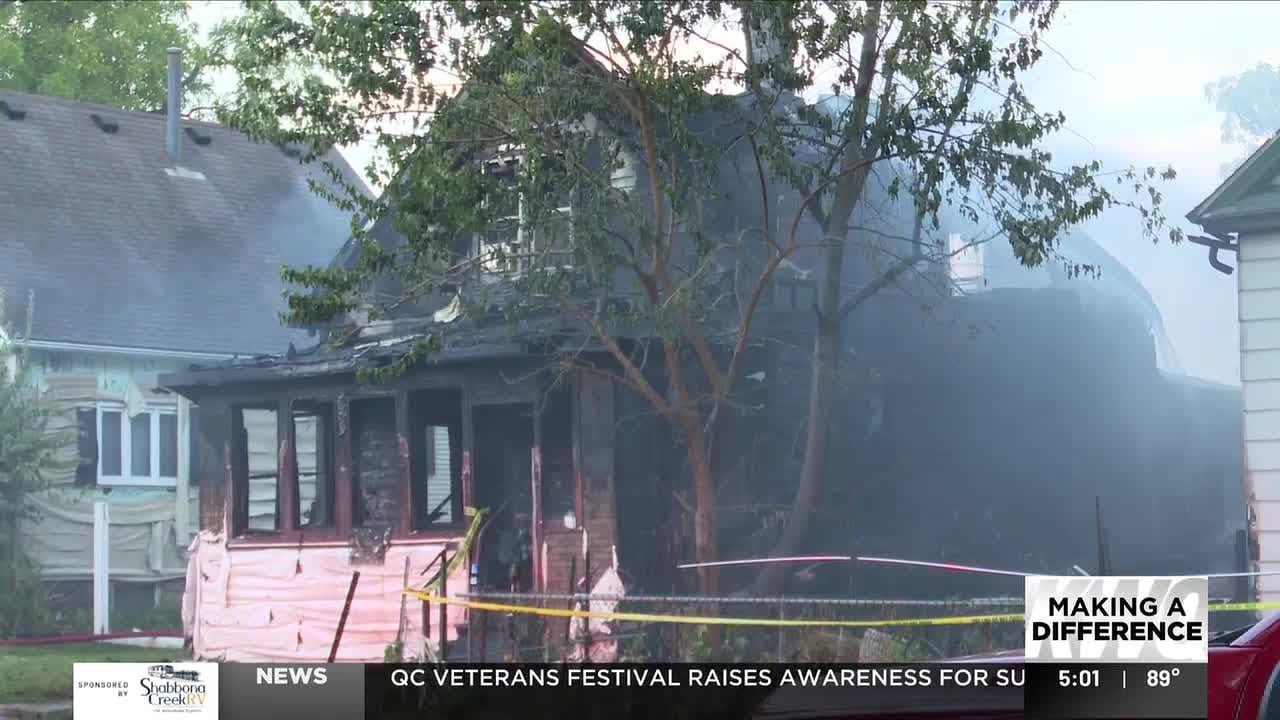 Hoarding situation causes difficulty as crews fight house fire - YouTube