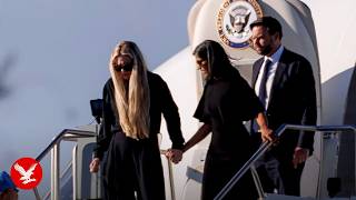 Charlie Kirk's wife Erika clutches Usha Vance's hand as casket arrives in Phoenix