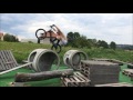 Bicyclists Does Jumps On One Wheel