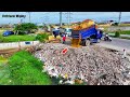 Skill Operator Bulldozer KOMATSU D31P, Filling Up The Land huge, Dump Truck unloading