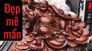 Mê mẩn trước tượng Di lặc gỗ hương ta đẹp sắc nét.