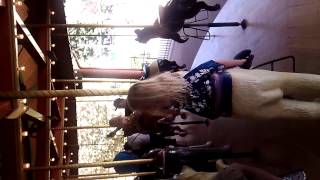 Kaitlyn and I riding the carousel on the last day