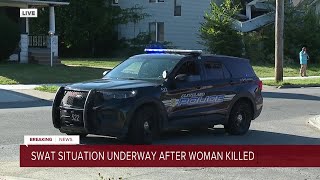 SWAT at scene of fatal shooting with armed man locked inside home, police say screenshot 5
