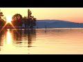 Ein Tag, von früh bis abends, am Bodensee bei Konstanz im Sommer; Landschaft, ohne Badestrandtumult.