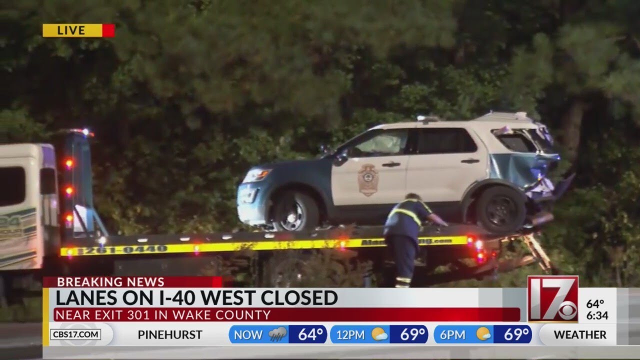 Unoccupied Raleigh police vehicle hit on I-40 - YouTube