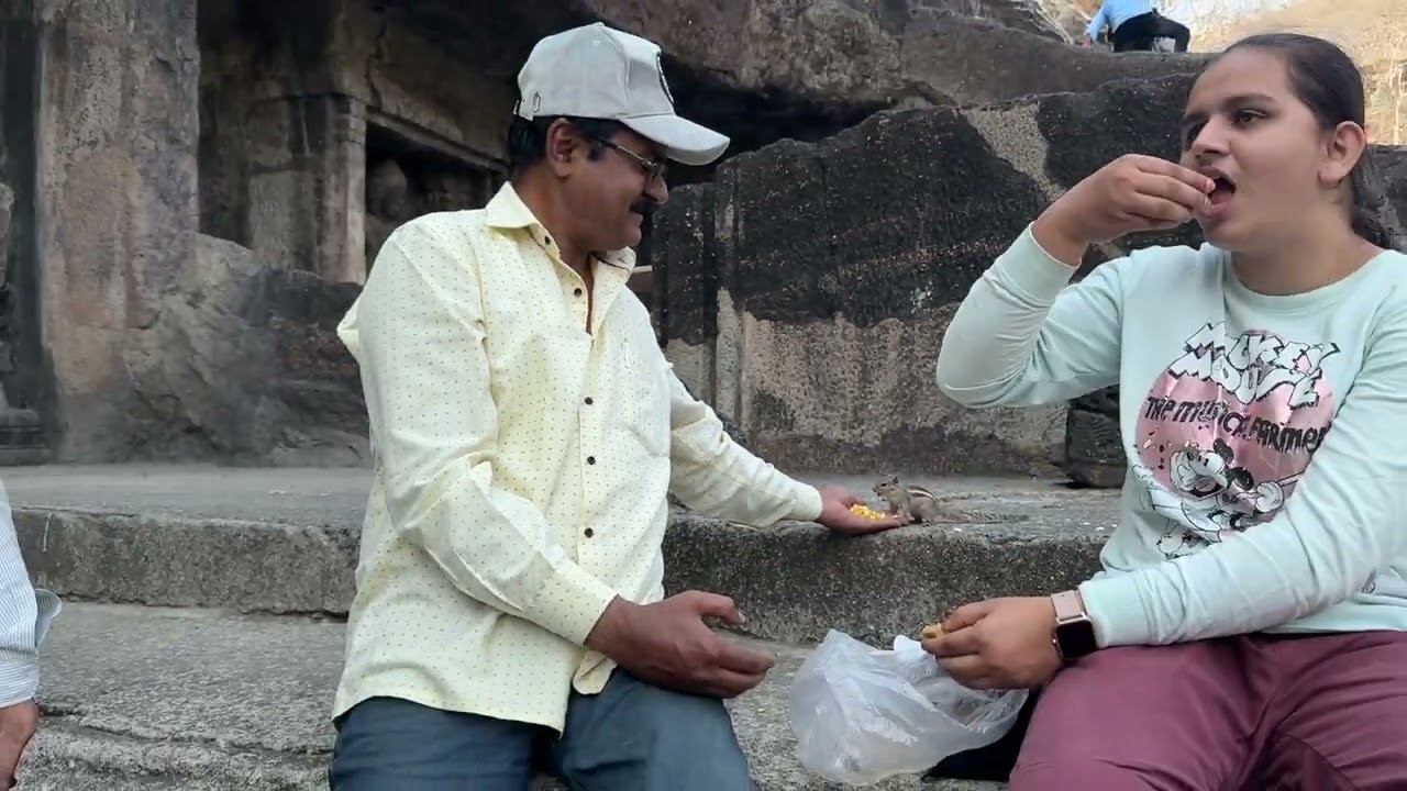 Papa trying to feed Squirrel 😍😊 at Ajintha Caves painting #minivlog #youtubeshorts #minivlog