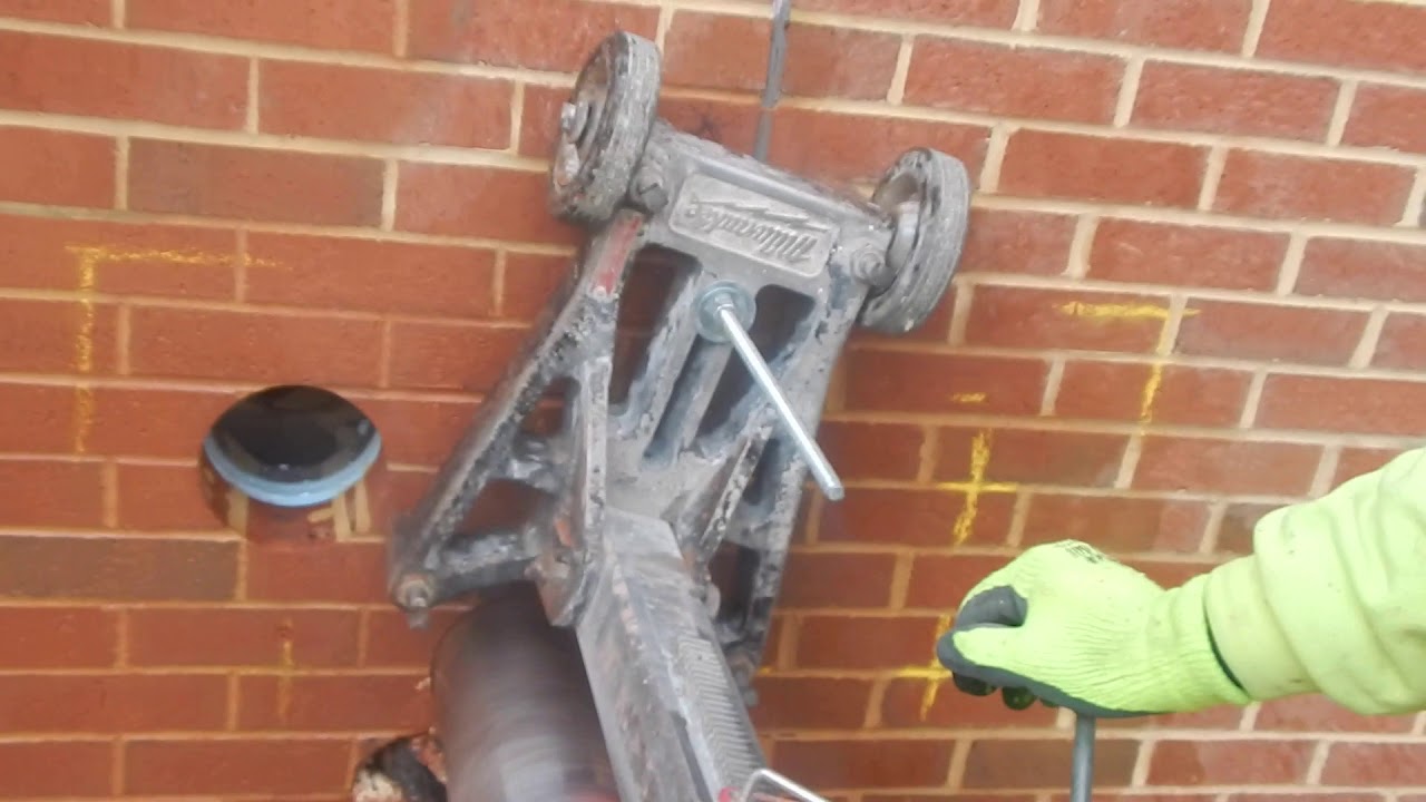 Core drilling with rig mounted to the wall YouTube