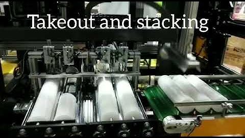 Automatic packing process of plastic lids into boxes